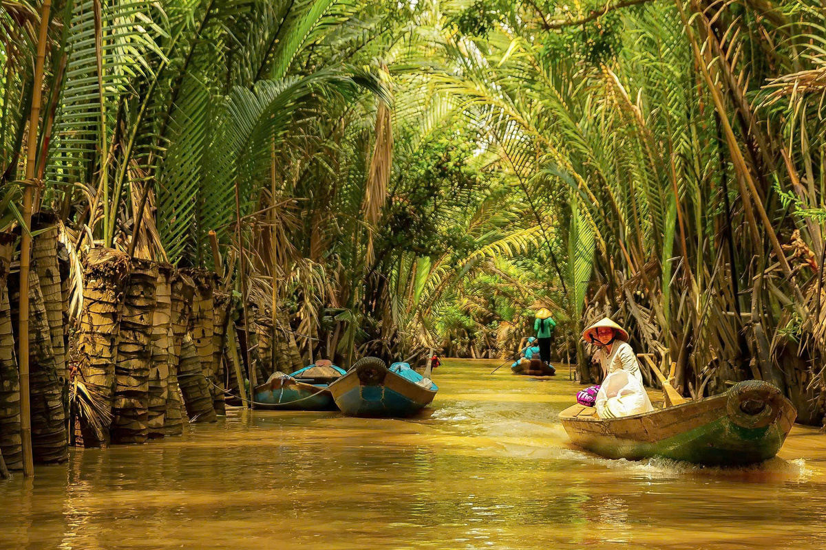 Solo traveler enjoying a boat trip in the Mekong Delta