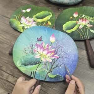 Fan painting activity for tour groups in Ho Chi Minh City