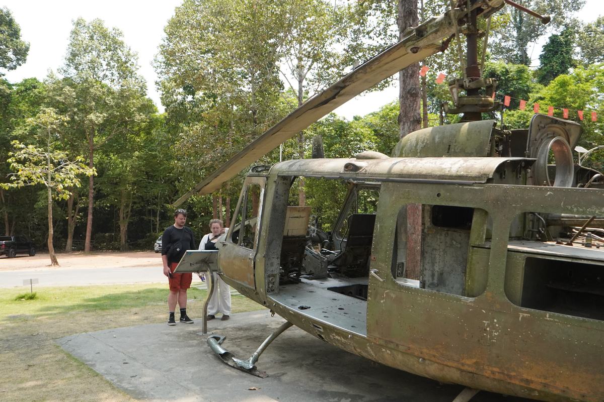 Morning vs full day Cu Chi tour: visitors at the helicopter display