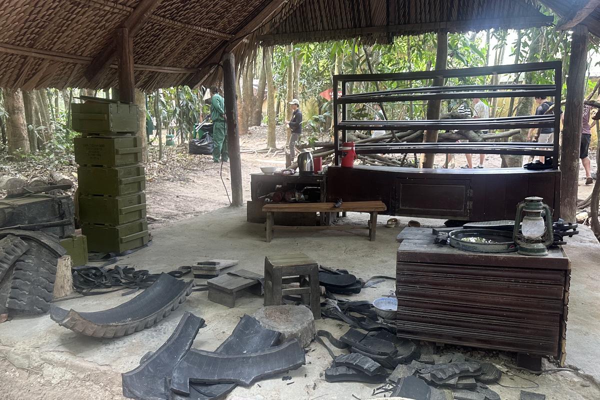 Cu Chi tunnel Ben Duoc trip idea: wartime tire-sandal workshop display at the Cu Chi Tunnels