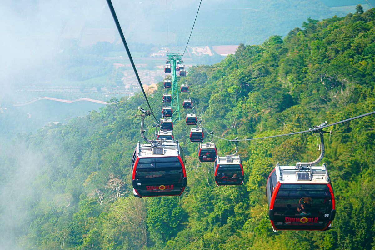 Cable car ride up Ba Den Mountain during a Tay Ninh day trip